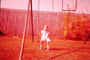 Joan at home on Kline Blvd Frederick Maryland 1963 on the swing